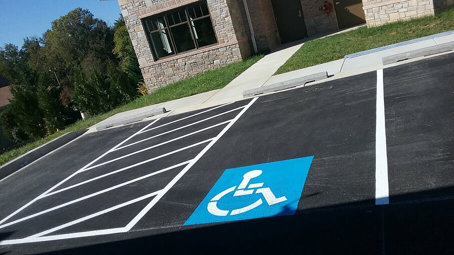 Hiring a Professional Parking Lot Striping Company vs. DIY